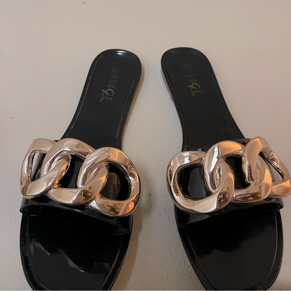 Black and gold sandals